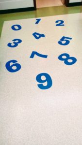 Floor signage to teach kids to count