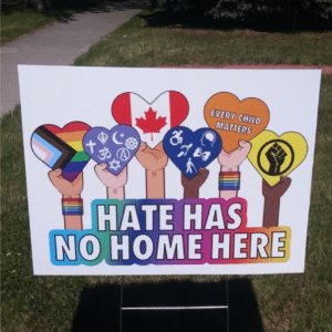 Hate has no home here sign